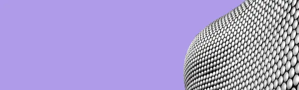 Curved modern building facade, representing the retail sector.